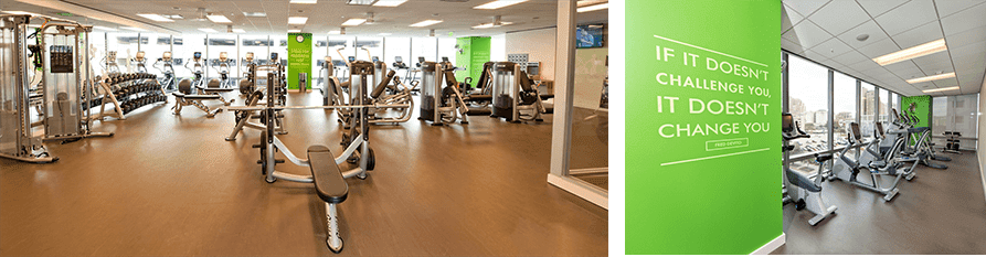 Spacious gym with exercise equipment and motivation.